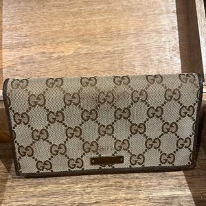 24494690959 Authentic Gucci leather wallet